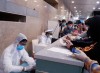 Chuyến bay đưa công dân Việt Nam từ Philippines về sân bay Cần Thơ vào đêm 18/3, các cán bộ khoa Phòng chống bệnh truyền nhiễm - Kiểm dịch y tế quốc tế, CDC Cần Thơ cũng làm việc từ 11 giờ đêm đến 2 giờ sáng hôm sau. Ảnh: Nguyệt Hương